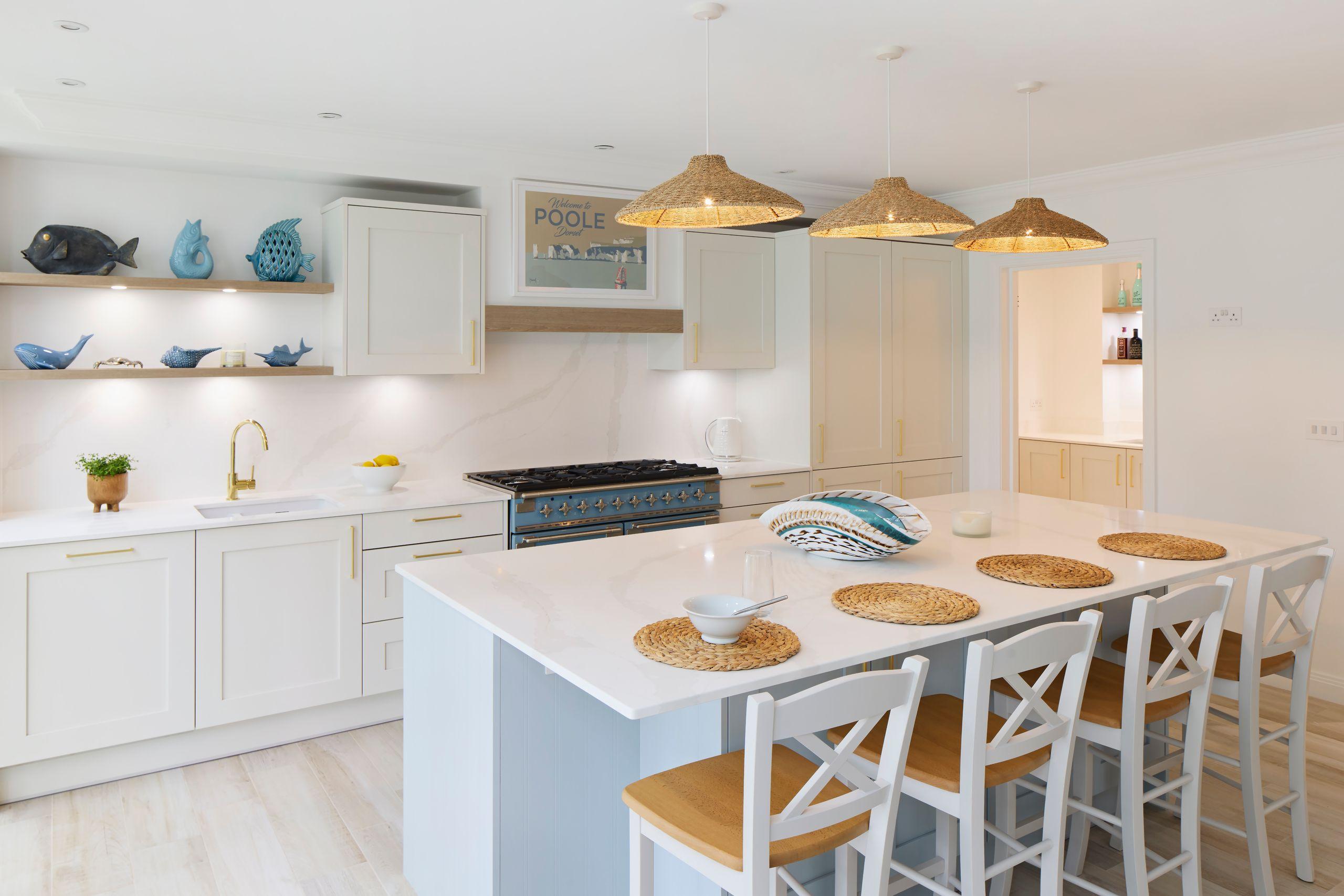 Full view of kitchen into utility room